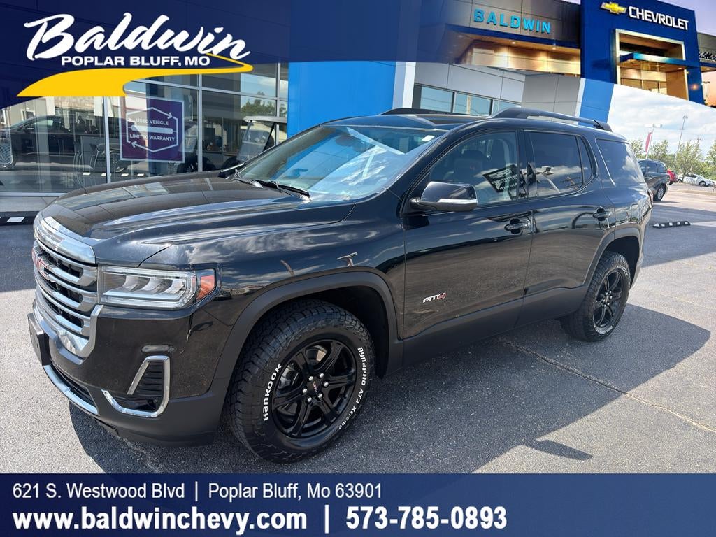 2022 GMC Acadia AT4 in Ebony Twilight Metallic — front three-quarter view