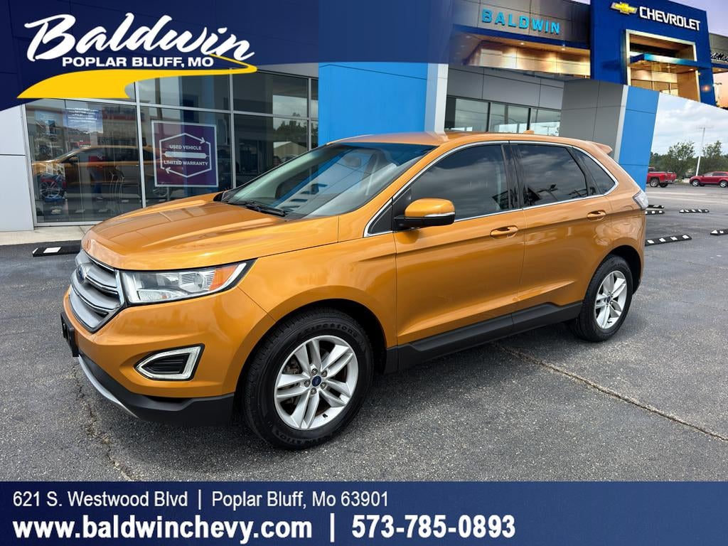 2016 Ford Edge SEL in White — front three-quarter view