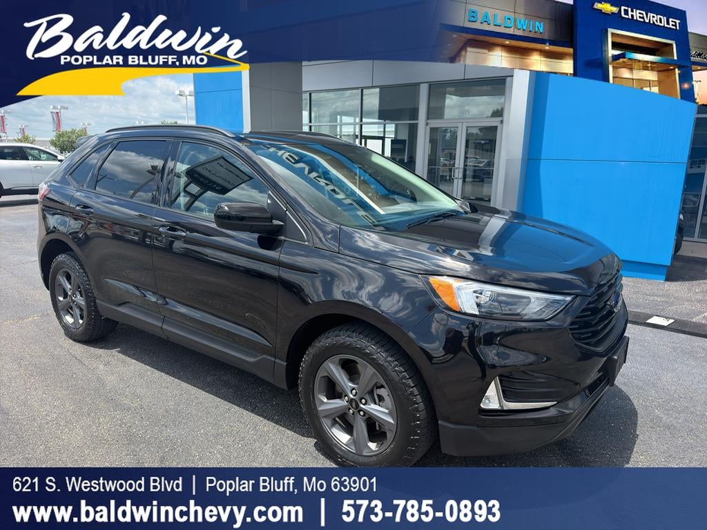 2024 Ford Edge SEL in Black — front three-quarter view